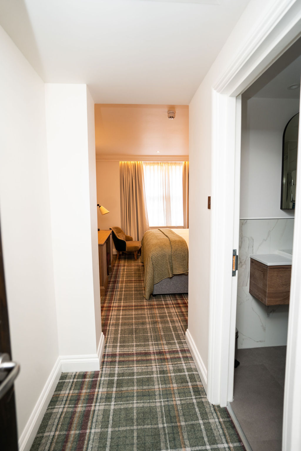 Hallway and bedroom after renovation